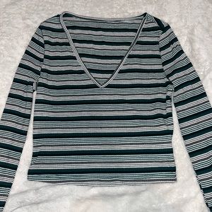 Green striped longsleave crop top and gray sweat pants